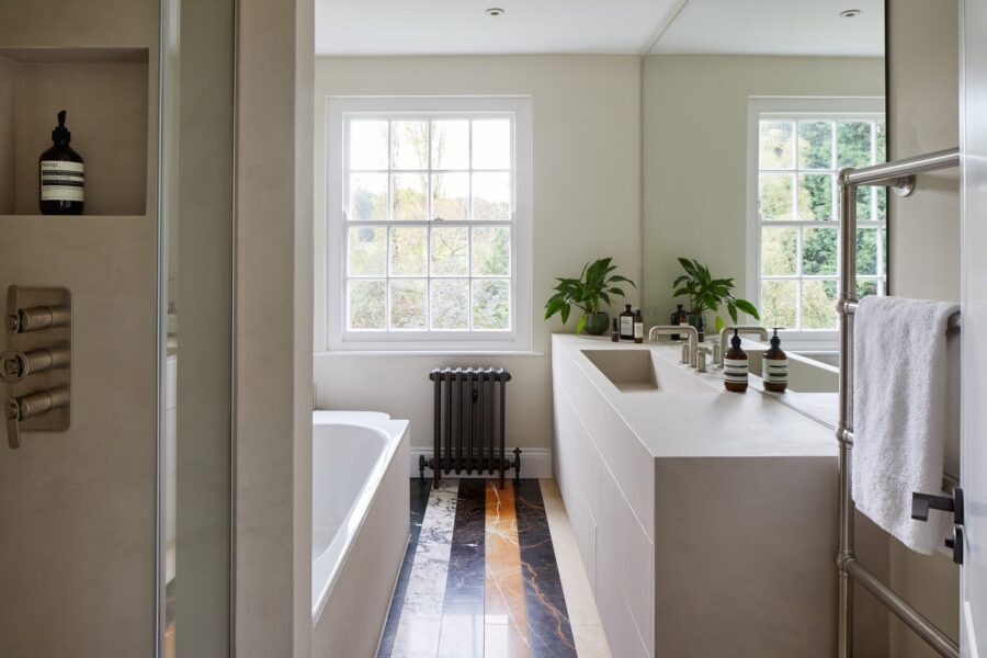 Family bathroom with microcement vanity