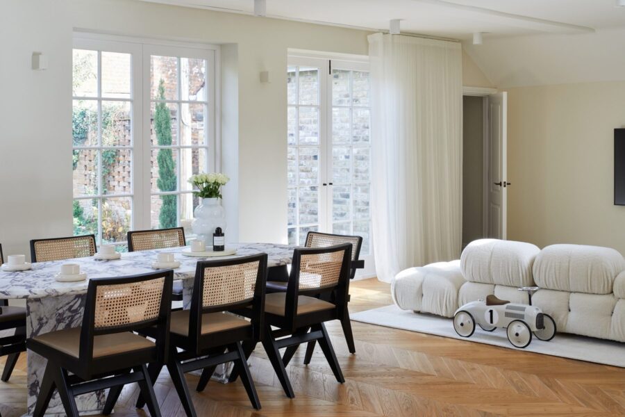 Dining room with marble table and cane chairs