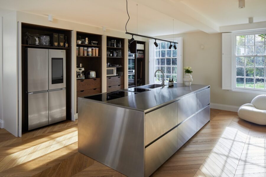 Stainless steel kitchen with hidden pantry