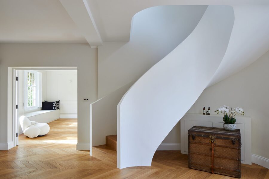 Sculptural curved plaster staircase