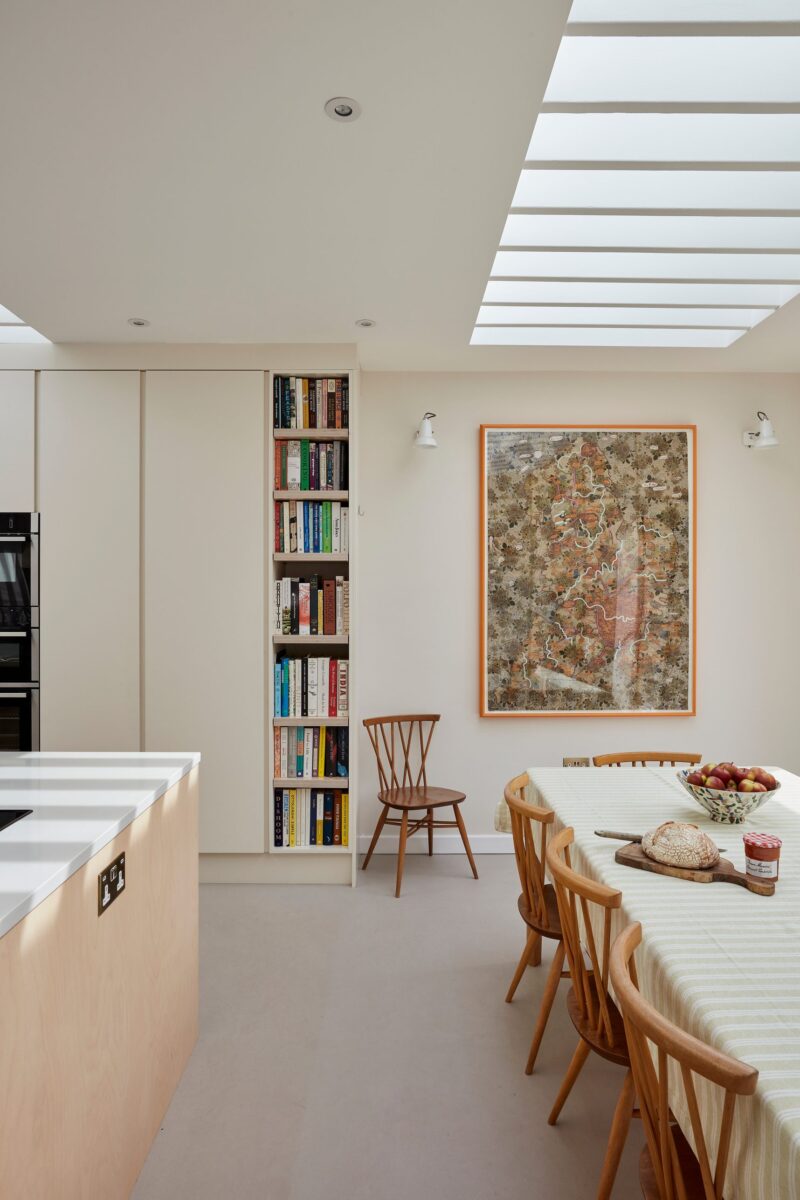 Plywood kitchen with built-in bookshelf
